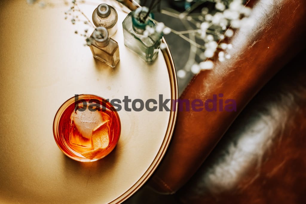 Top Down Of Old Fashioned On A Gold Tray