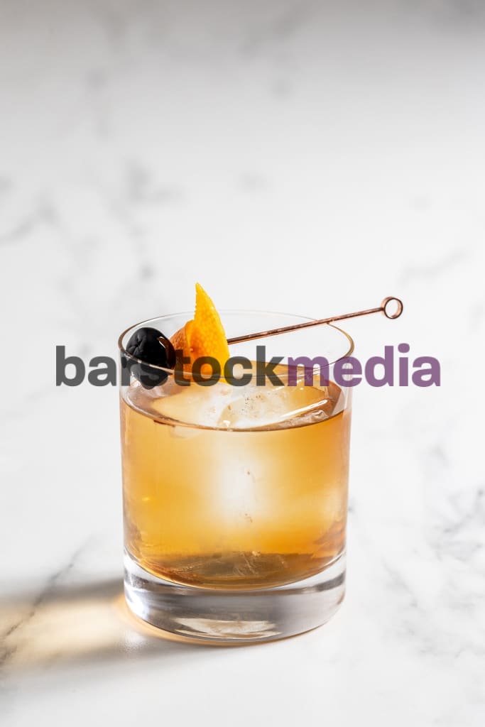 Old Fashioned On White Marble Photo