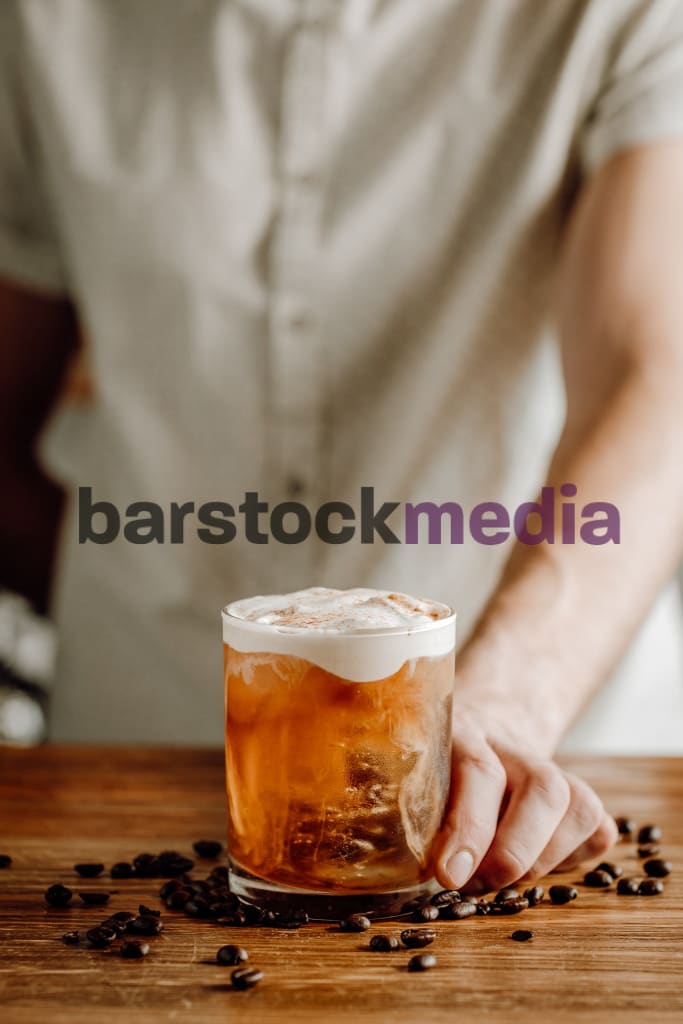 Layered Coffee Cocktail On Wood Bar Top Photo