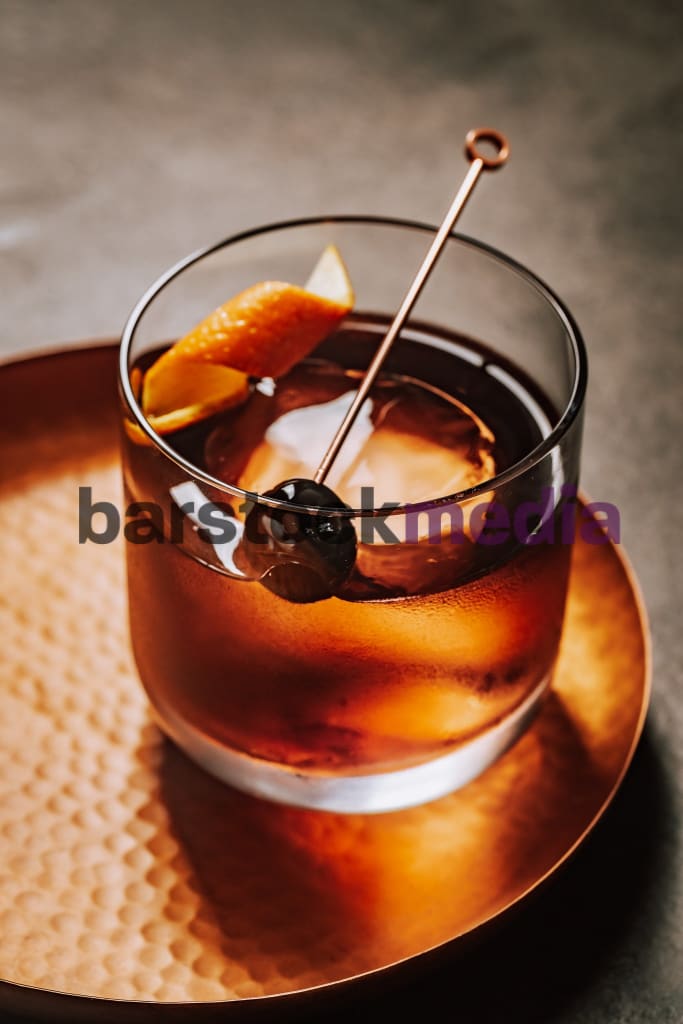 Old Fashioned Cocktail On Copper Tray