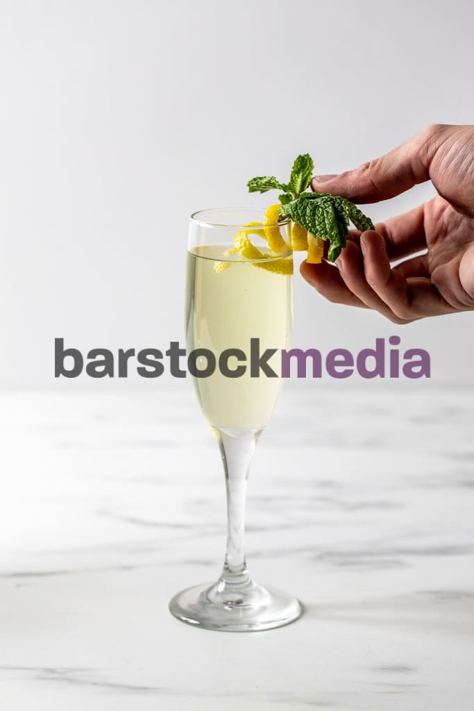 French 75 Garnished With Mint Photo